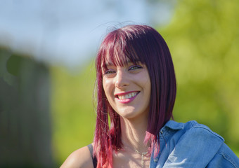 Wall Mural - beautiful young woman with red hair, outdoors