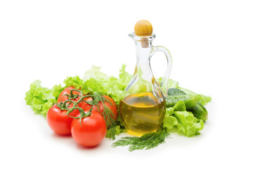 Set vegetable and jug of vegetable oil isolated on the white bac