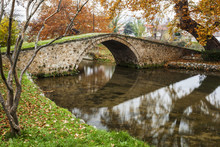 Scenic View Of Stone Bridge Over The River