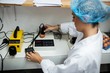 © Wavebreak Media - Female staff examine egg on digital egg monitor