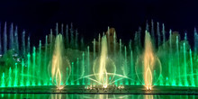 Musical Fountain With Colorful Illuminations At Night. 