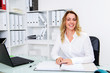 © Firma V - young blond businesswoman