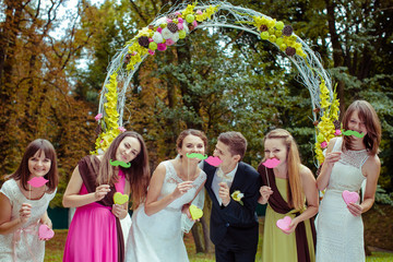 Wall Mural - White wedding altar decorated with green apples and flowers stan