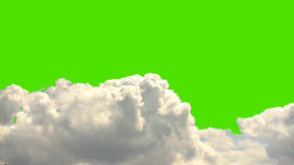 Wall Mural - real clouds time lapse on a green screen background