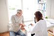 © Syda Productions - old man and doctor with prescription at hospital