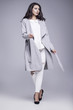© dorriss - Beautiful young woman in an elegant gray coat