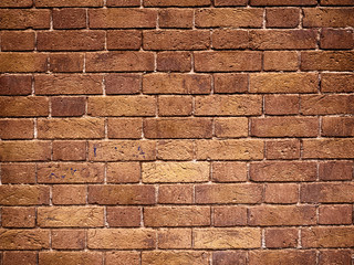 Weathered stained old brick wall background