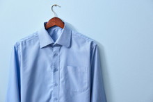 New Male Shirt On Blue Background