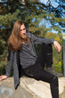© Rob Rye - Portrait of man with a long beard and a long hair on the bridge