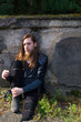 © Rob Rye - Portrait of man with a long beard and a long hair near the wall