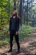 © Rob Rye - Portrait of man with a long beard and a long hair in the forest