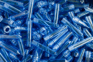 many flasks for the production of plastic bottles close-up