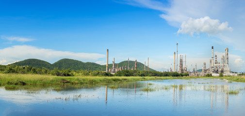 oil refinery plant against blue sky