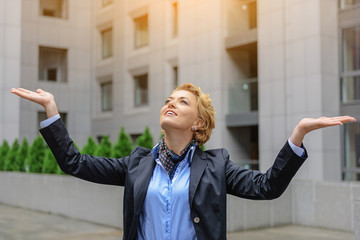 Wall Mural - Successful woman is grateful for her achievement