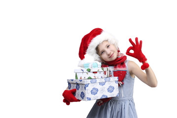 holidays, presents, Christmas, x-mas, birthday concept - happy little girl opening gift box over light background
