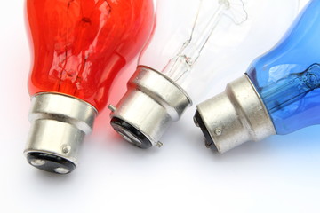 Red white and blue light bulbs in white background - patriotic flag concept