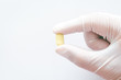 © Art_Photo - Hand in rubber glove with pill