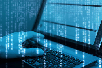 hacker hands at work with graphic user interface around