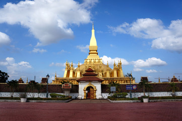 Wall Mural - Pha That Luang in bright sky day. Vientiane, Laos