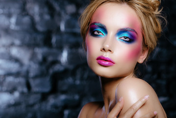 High fashion look.glamor closeup portrait of beautiful sexy stylish blond young woman model with bright makeup and pink lips with perfect clean skin 