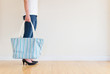 Woman wearing jeans High heels Shopping bag