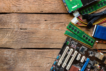 computer hardware on a wooden background and space for text