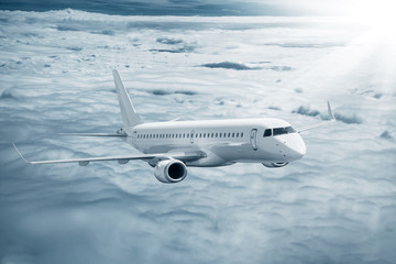 Wall Mural - White airplane flying higher clouds at daytime