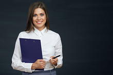 Smiling Business Woman Holding Clipboard With Pen.