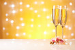 Champagne on a yellow background.