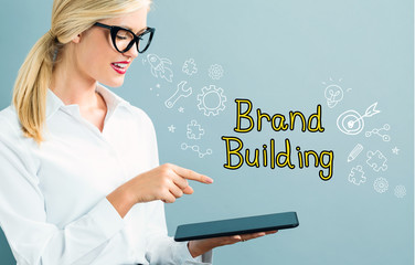 Wall Mural - Brand Building text with business woman