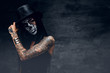 © Fxquadro - A girl in stylish top hat with skull make up.