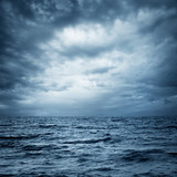 Fototapeta Na sufit - Stormy Sea and Sky. Dark Dramatic Background.