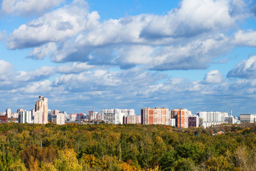 Poster - autumn landscape with forest and city in sunny day