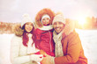 © Syda Productions - happy family with child in winter clothes outdoors