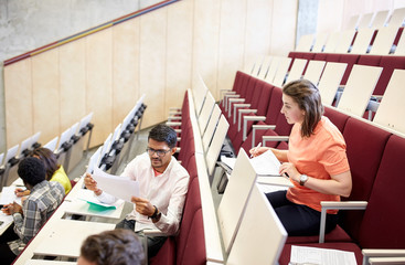 Canvas Print - group of students with tests at lecture hall