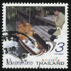 Sticker - monk in a boat and a beadswoman