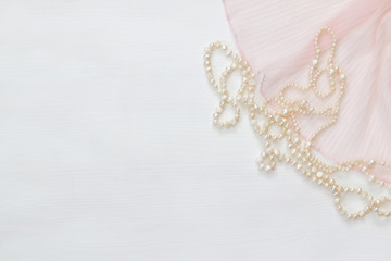 Wall Mural - Top view image of white pearls necklace