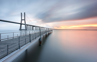 Wall Mural - Gentle Sunrise at Lisboa looking to a magnificent bridge