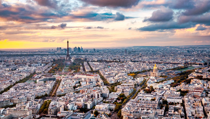 Wall Mural - Aerial Paris view in late autumn from Montparnasse Tower at sunset. Eiffel Tower in the distance and financial district.