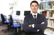 © Africa Studio - Male librarian on blurred reading room background