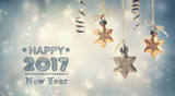 Fototapeta  - Happy New Year 2017 message with hanging stars