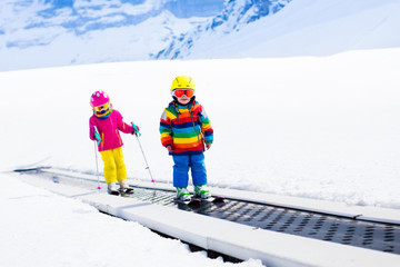 Wall Mural - Child on ski lift