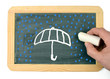 Regenschirm und Wassertropfen Tafel