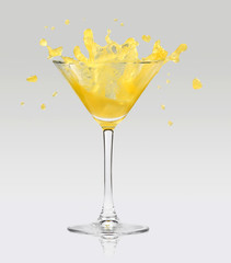 Canvas Print - Orange juice splashing out of glass