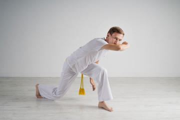 Man practicing capoeira , brazilian martial art.