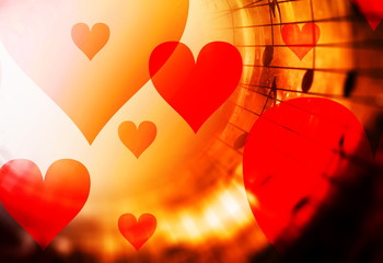 Fototapete - beautiful collage with hearts and music notes in cosmic space, symbolizining the love to music.