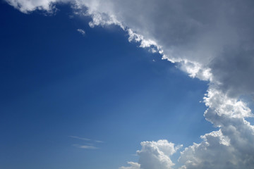 Blue sky with rain clouds