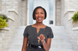 © grinny - African-American realtor woman with key.