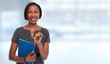 © grinny - African-American realtor woman with key.