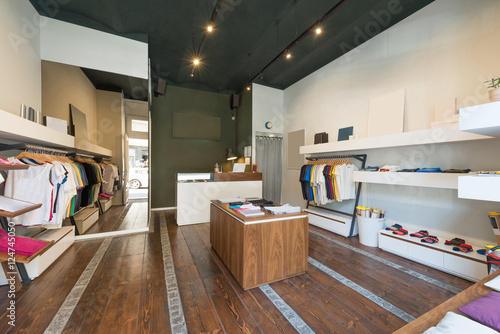 Fotografía Interior of modern urban fashion clothes t-shirt store